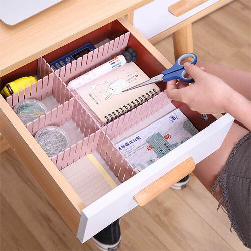 Drawer organizer with adjustable dividers and compartments.