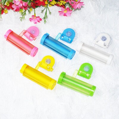 1 PCS Creative Rolling Squeezer Toothpaste Dispenser Tube Pa