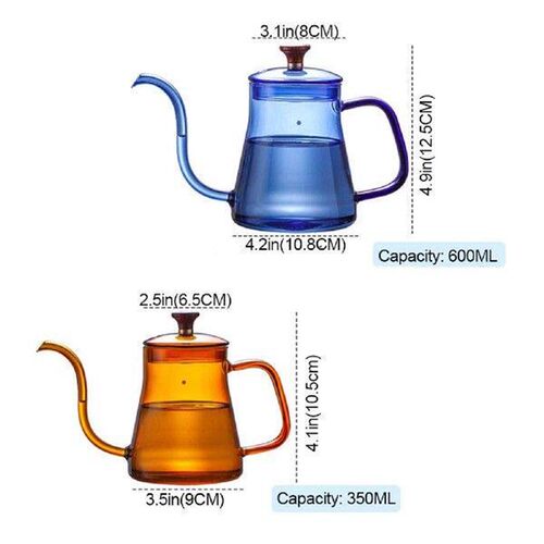 Glass of tea pouring over premium grade kettle with lid for
