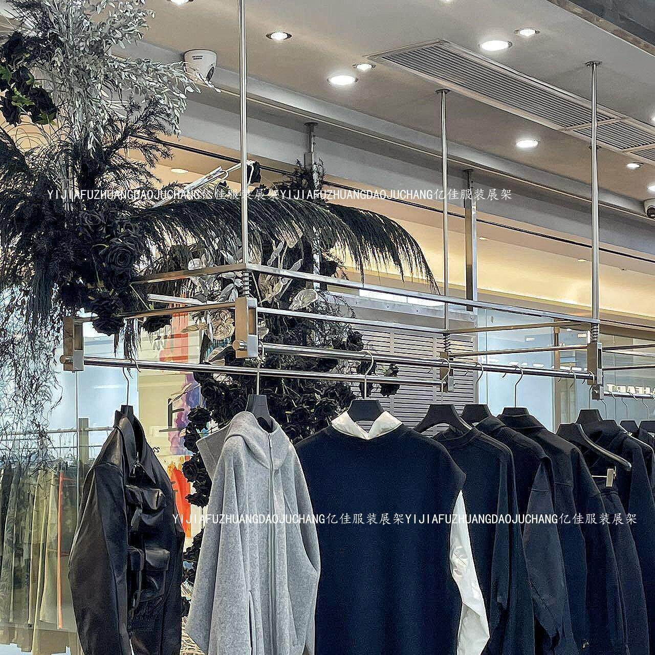 广州定制服装店工业风展示架男装店上墙不锈钢挂衣架买手店吊挂架