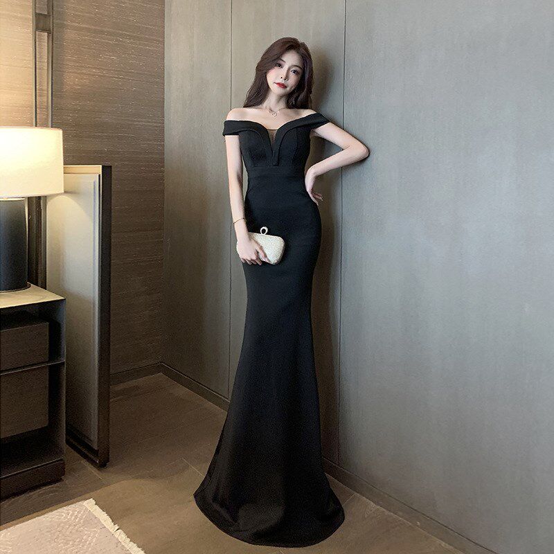 名媛高级感时尚一字领露肩修身晚礼服女夜场鱼尾裙性感黑色连衣裙