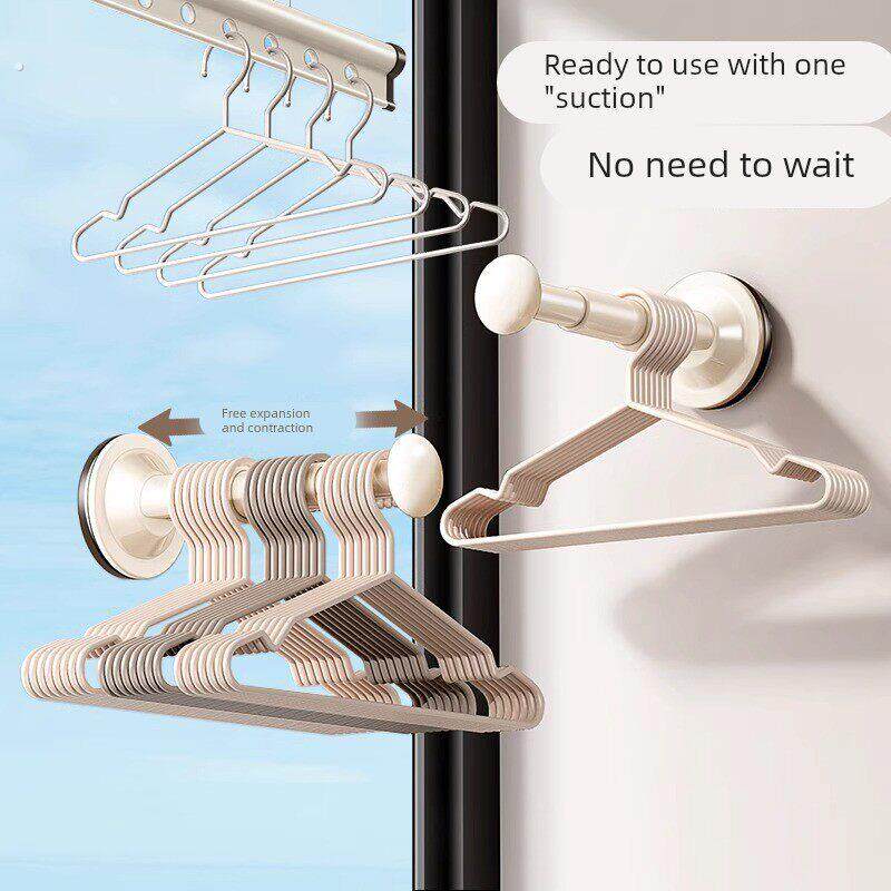 吸盘衣架收纳神器家用阳台多功能伸缩免打孔无痕挂衣架子墙上壁挂