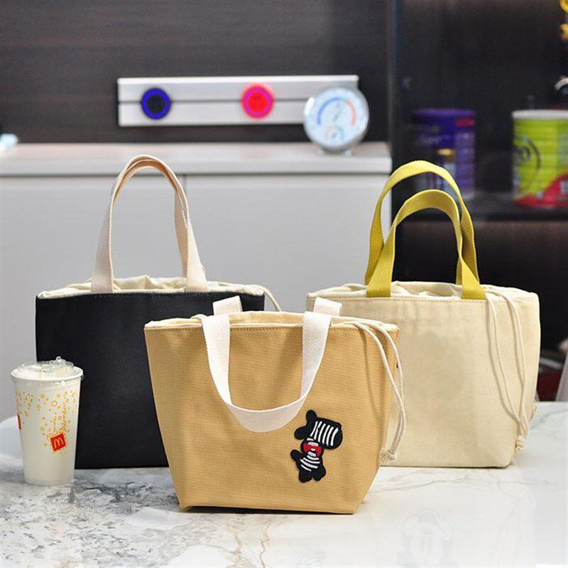 卡通加厚防水便当包束口保温饭盒袋学生带饭上班族通勤手拎餐包