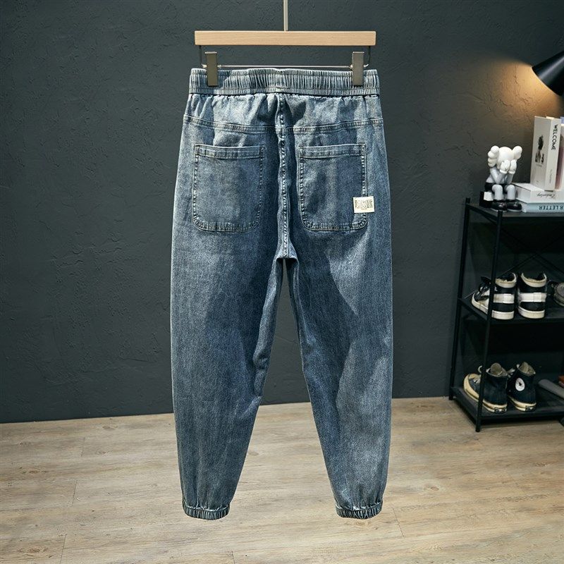 黑灰弹力松紧腰牛仔裤男款宽松大码束脚裤春季薄款休闲哈伦九分裤