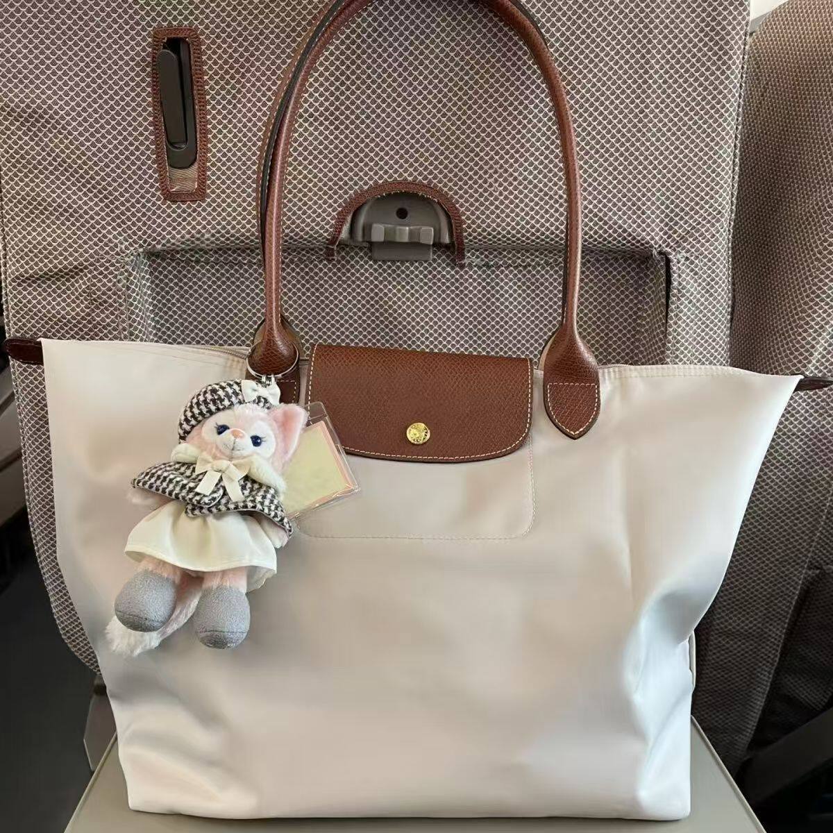新款时尚通勤简约托特百搭大容量防水单肩妈咪尼龙旅行手提包