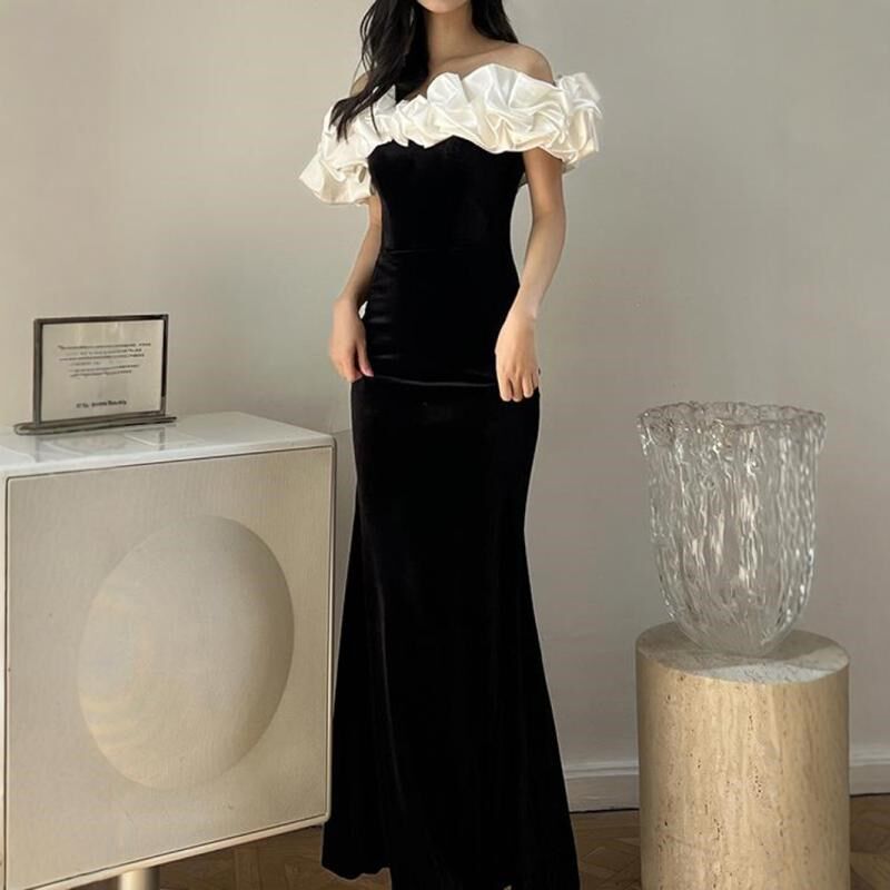 一字肩黑色晚礼服2024新款名媛气质高端鱼尾连衣裙迎宾主持人年会