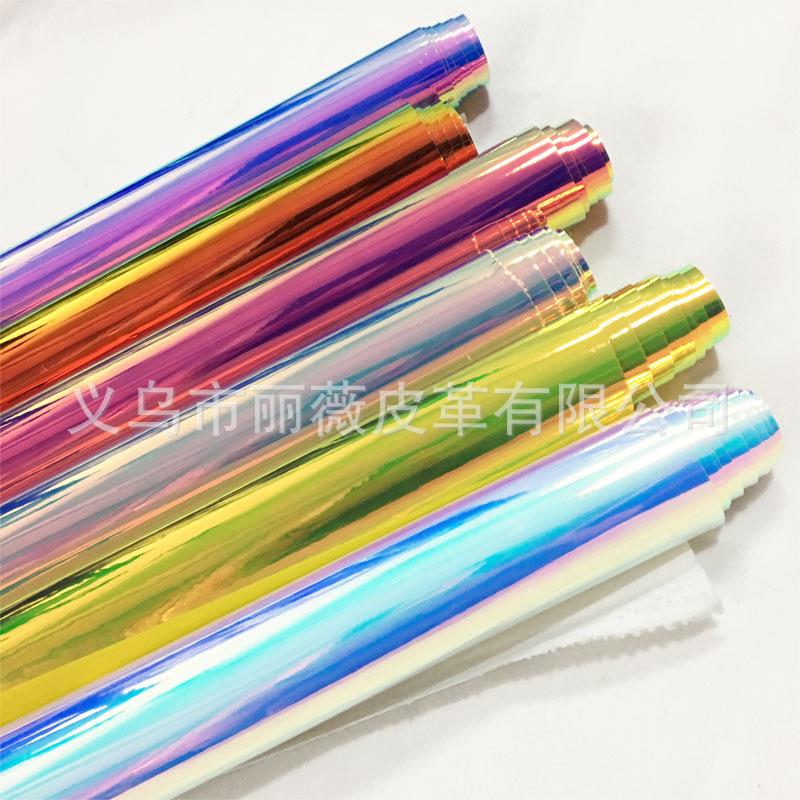 镭射反光pu幻彩镜面贴膜皮料七彩虹pvc人造革炫彩箱包鞋材服装革