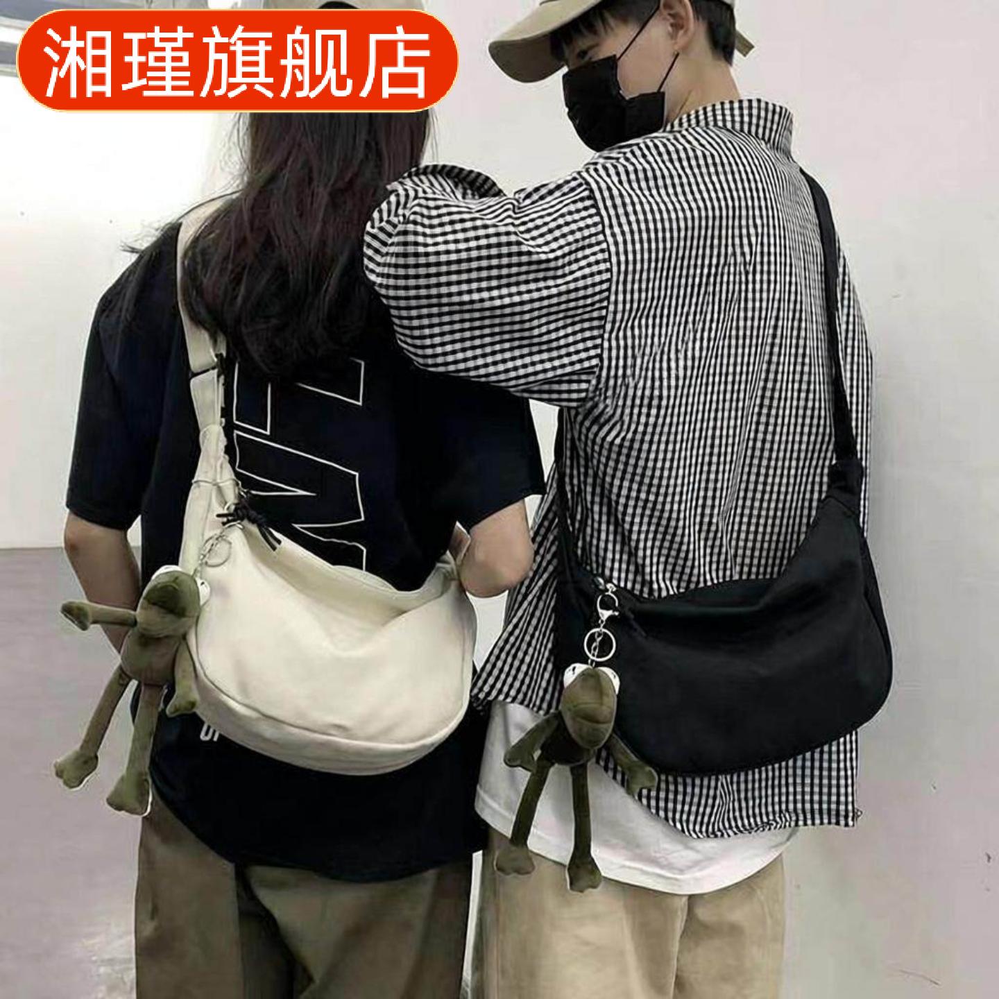 日系休闲帆布单肩斜跨挎包男街头