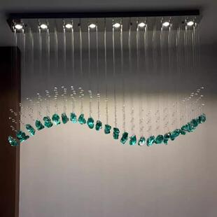 餐厅吧台岛台水晶吊线石头灯酒店前台波浪形会所收银台隔断鱼线灯