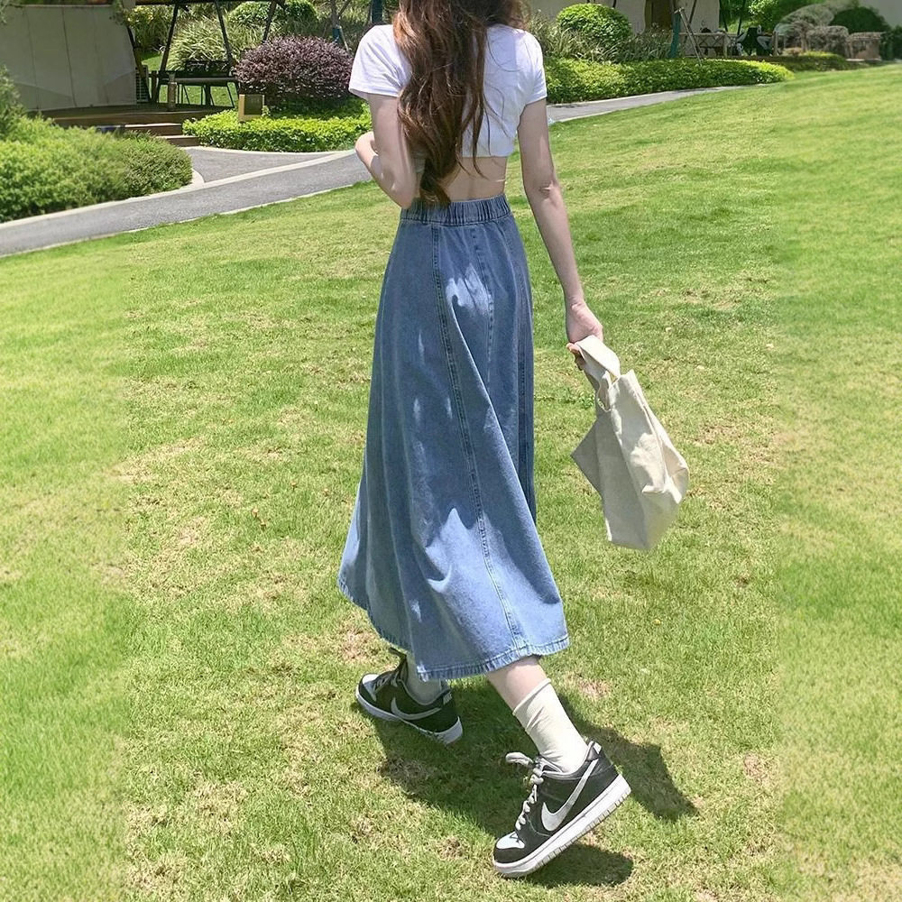 高腰牛仔半身裙女2025春秋新款显瘦百搭松紧腰a字中长款大摆伞裙