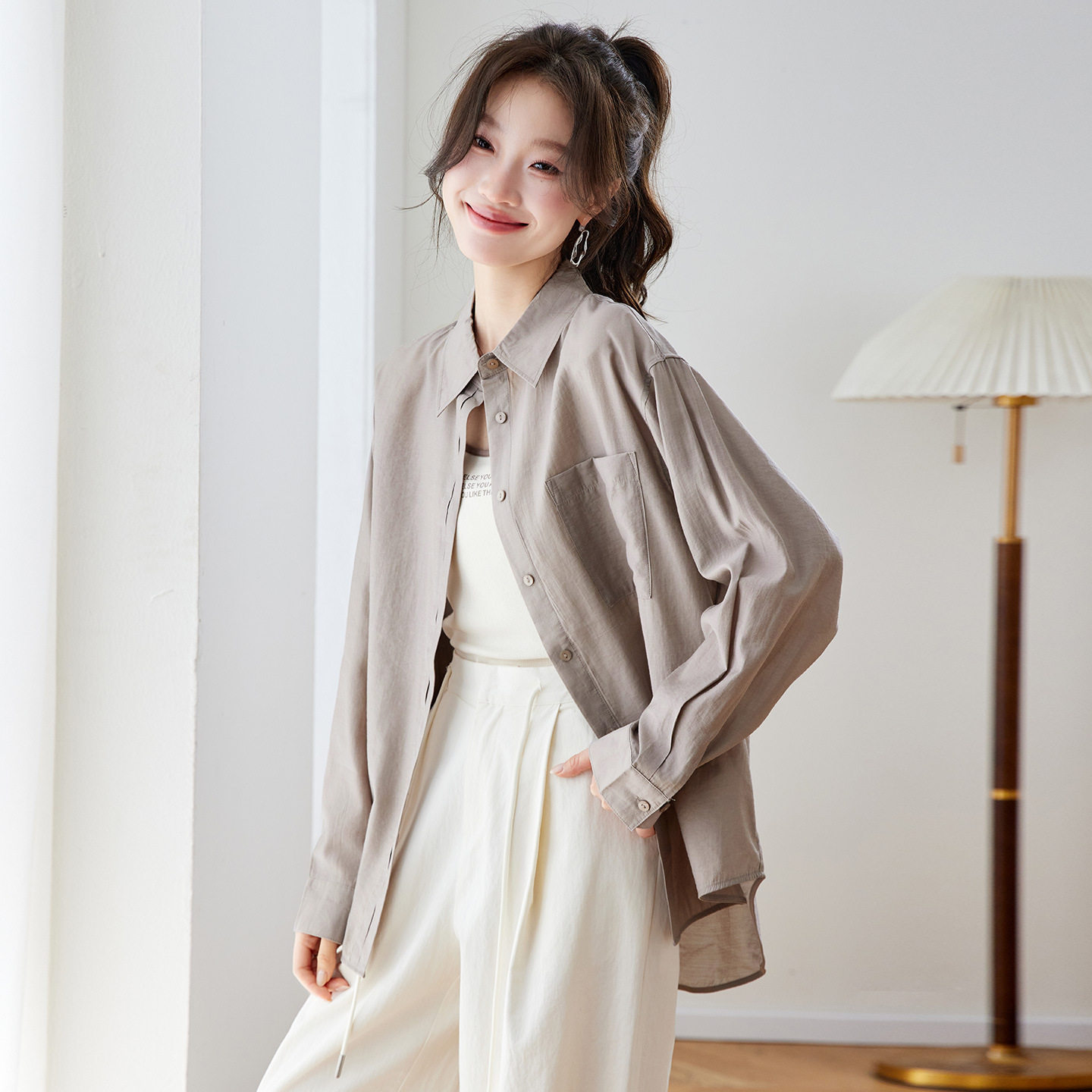 夏季薄款蓝色天丝防晒衬衫女2026新款轻奢高级感外搭宽松长袖外套