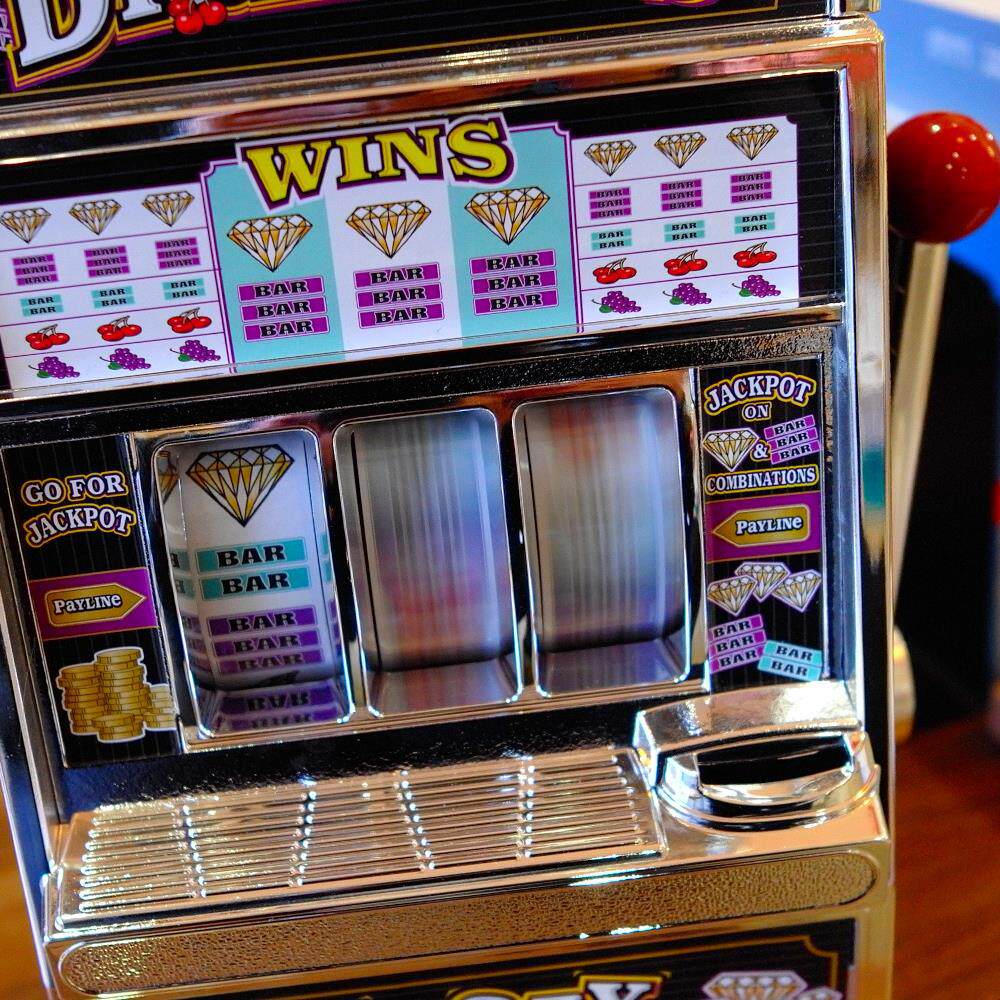 一个创意 给你带来幸运的存钱罐娱乐硬币存钱机 储蓄罐造型游戏机