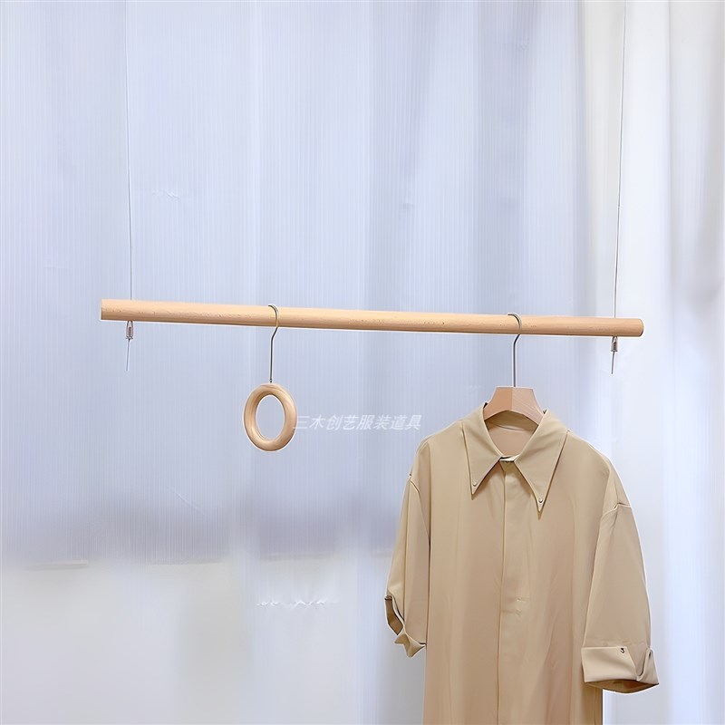 服装店钢丝实木悬挂衣杆简约麻绳吊挂橱窗吊杆上墙吊顶侧挂展示架