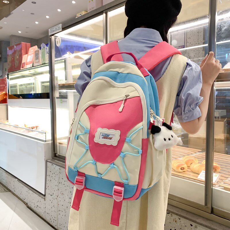 减负书包女初中生高中学生双肩包大学生韩系撞色大容量电脑背包女