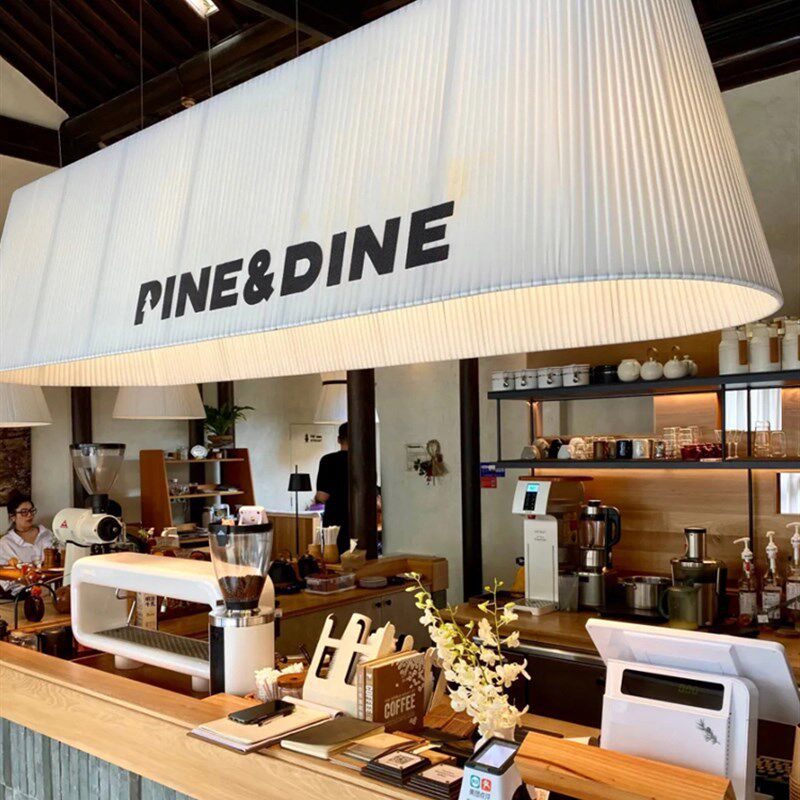 简约餐厅吧台吊灯咖啡厅服装店椭圆长条梯形奶茶前台布艺灯罩