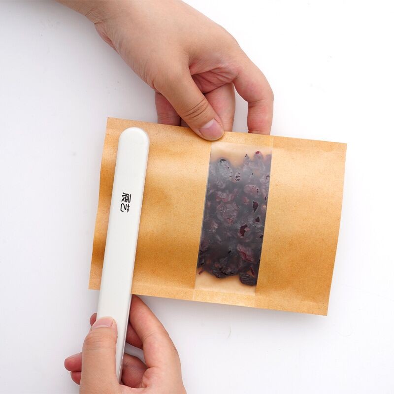 展艺封口机小型家用便携式牛轧糖零食包装袋插电热手压密封器工具