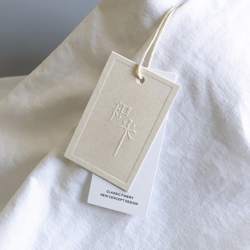 吊牌定做衣服标签商标订制女装挂牌定制免费设计logo高档特种纸凹