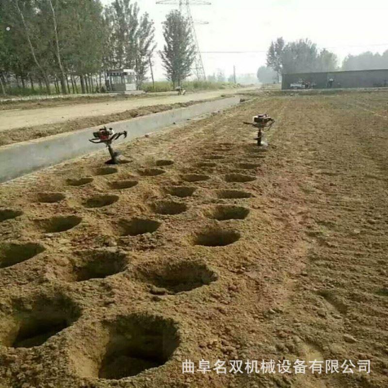 土质地打坑钻洞机多用途果农植树施肥地钻手推轮式挖坑机