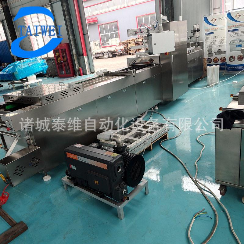 泡椒凤爪卤味鸭脖大批量全自动拉伸膜真空包装机拉伸膜真空包装机