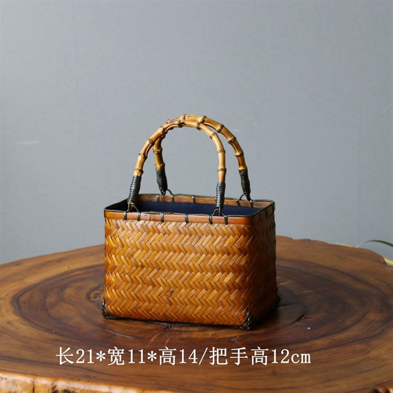 手工编织女手提包手拎包收纳包时尚复古竹编包手提篮子藤编包摄影