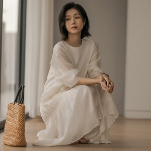 无谓韩式文艺2024夏季新款女装圆领宽松显瘦压褶过膝气质连衣裙女
