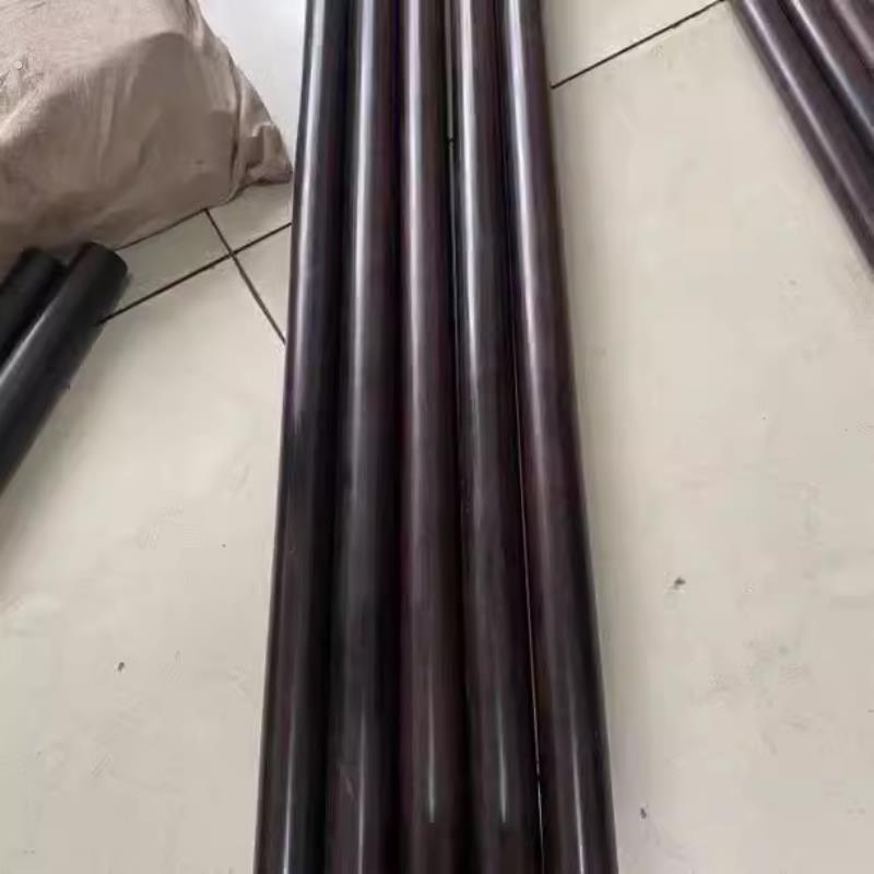 黑檀木圆棒紫光檀武术棍圆柱把玩棍武术健身棍车载防身棍原木短棍图片
