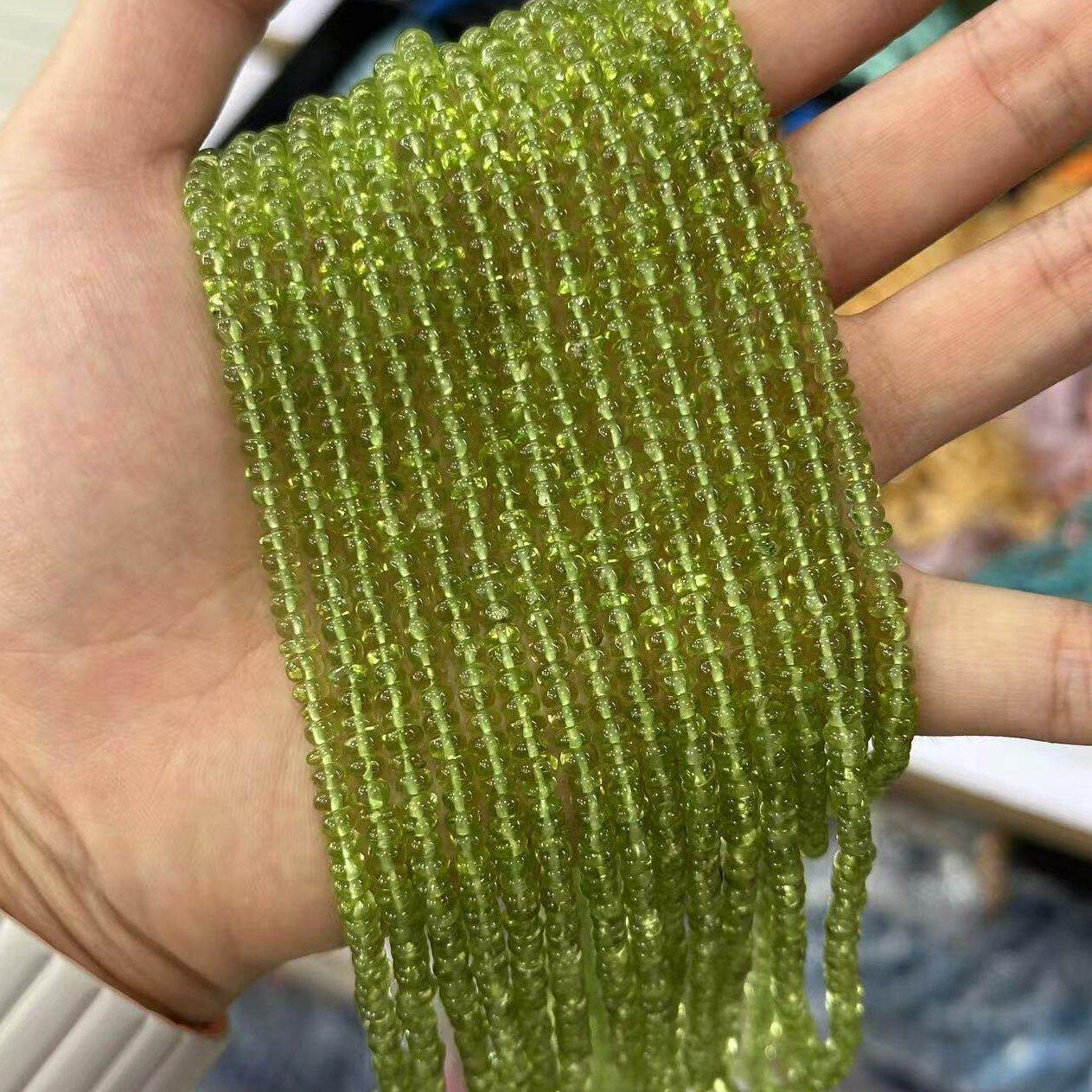 甄选天然橄榄晶算盘珠巴洛克不定形圆算盘果绿色透体橄榄石车轮珠