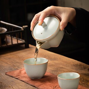 匠仙月白汝窑快客杯一壶二杯开片可养陶瓷收纳便携式旅行茶具户外