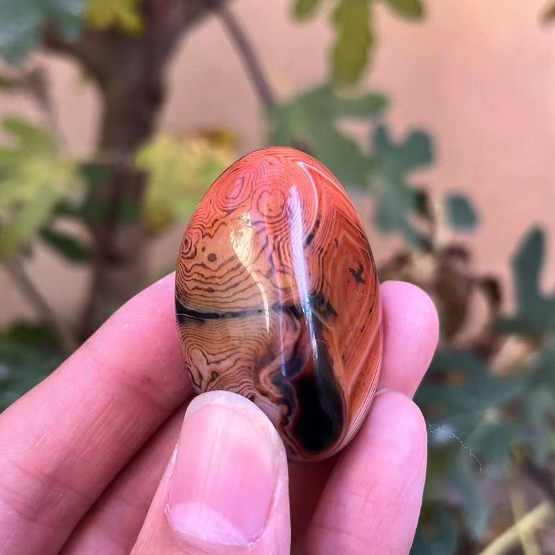 零售天然矿物水晶石红玛瑙水晶大颗粒Q缠丝玛瑙水晶把玩