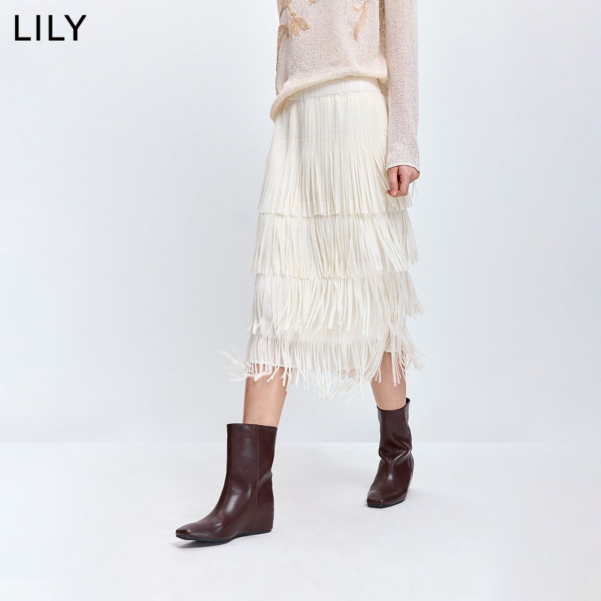 LILY2026春新款设计感度假风流苏休闲气质通勤白色半身裙蛋糕裙女