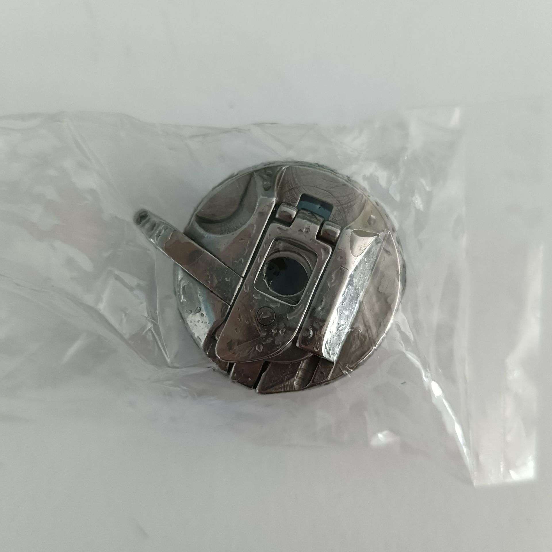 电脑缝纫机零件 兄弟S59221501梭芯套缝纫机配件零件