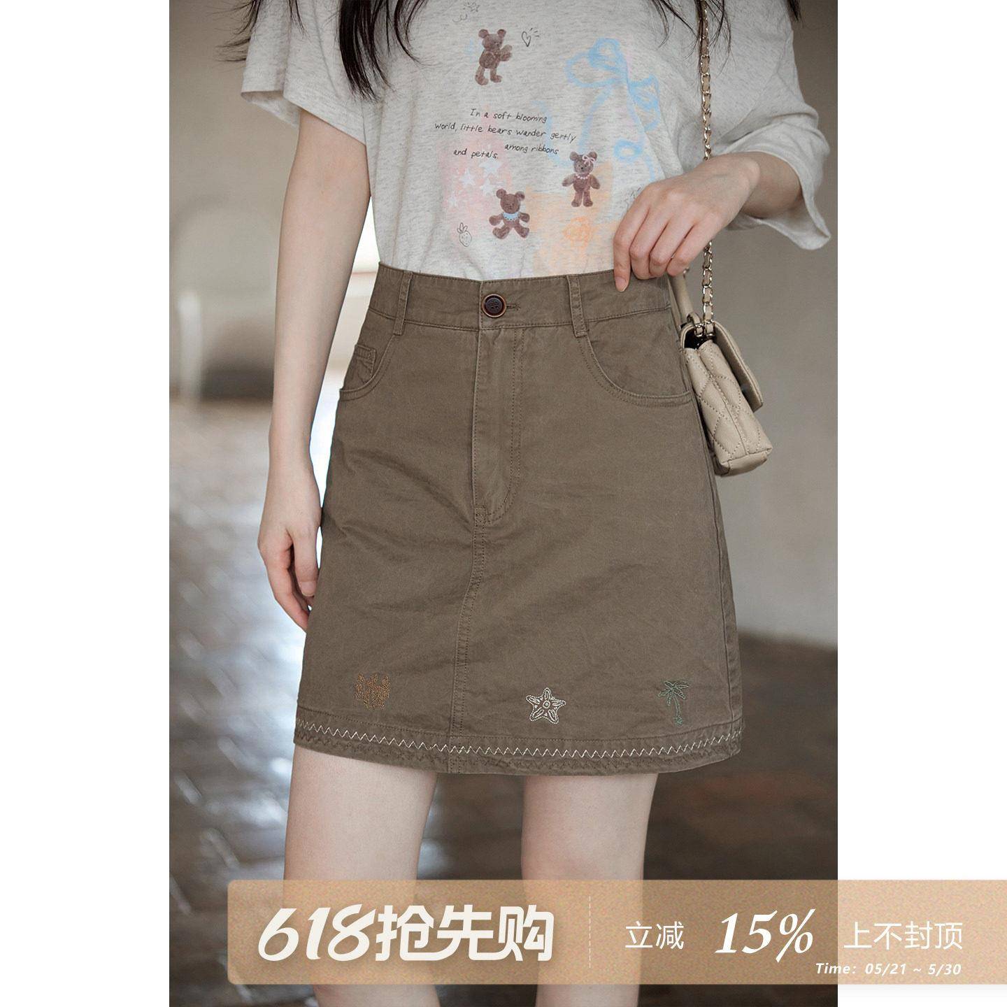 夕蒙2026新款夏季韩系气质漂亮裙子复古绣花短款咖色a字半身裙女