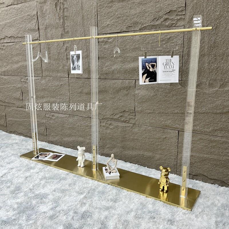 服装店展示架轻奢不锈钢压克力落地式中岛架钛合金陈列架挂衣架定图片