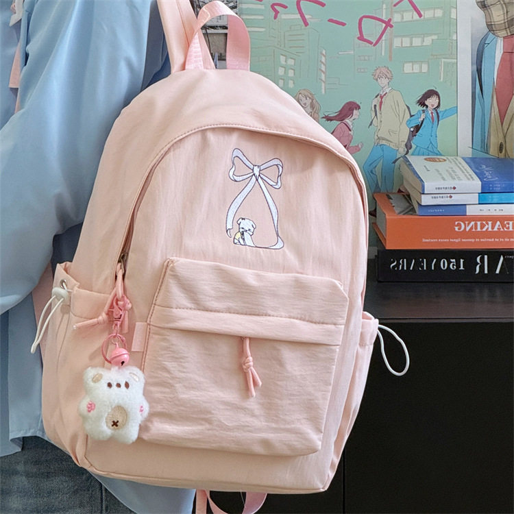 小清新蝴蝶结初中学生书包女新款轻便简约少女双肩包休闲校园背包