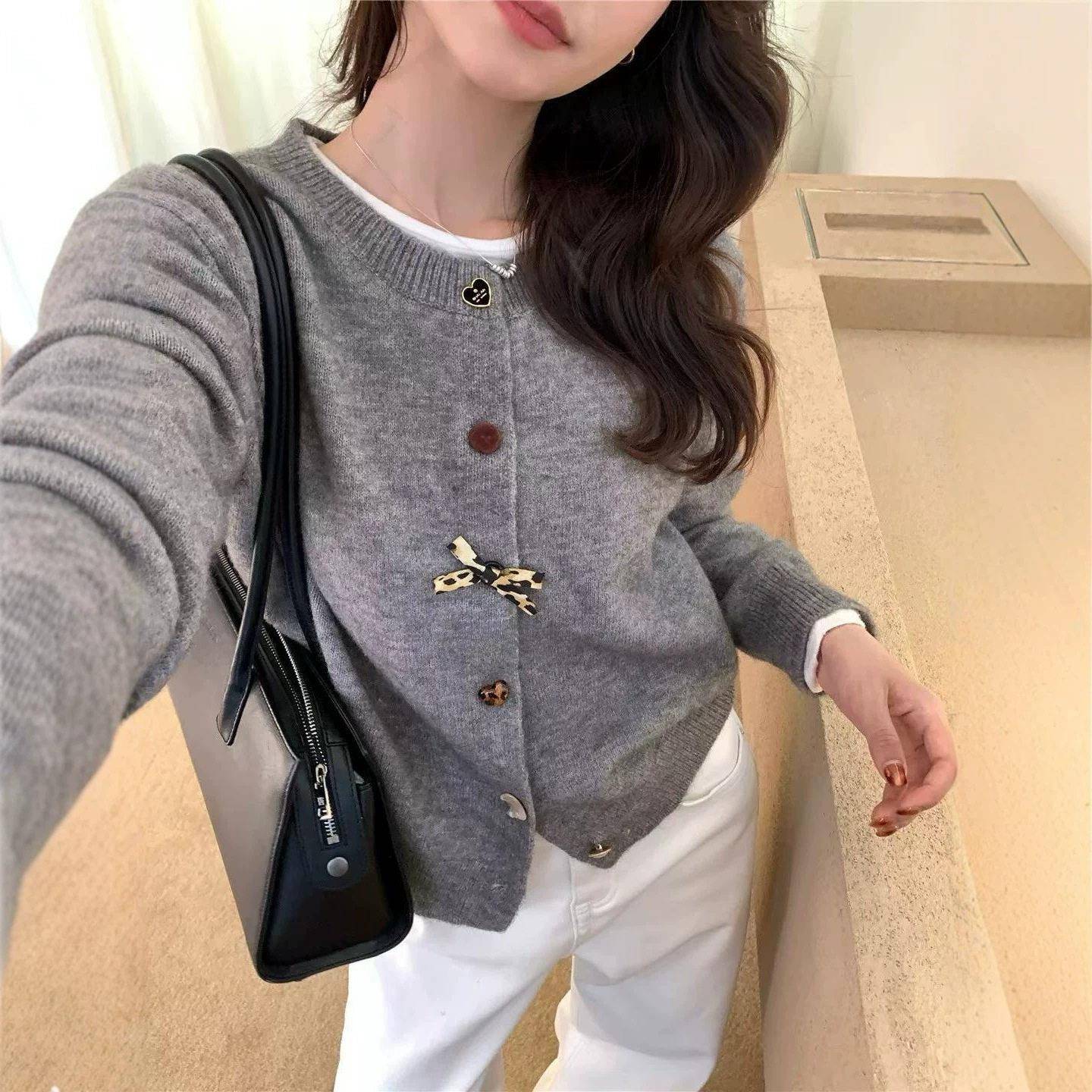 202蝶6早秋新款女装蝴不规则纽UHL扣针衫织开女慵结懒风显瘦上衣