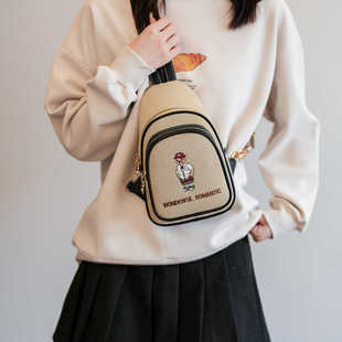 高级感帆布手机包2026春季新款复古斜挎包百搭休闲时尚胸包单肩包