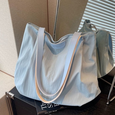 休闲大容量包包女夏季轻便单肩包简约百搭帆布托特包大学生通勤包