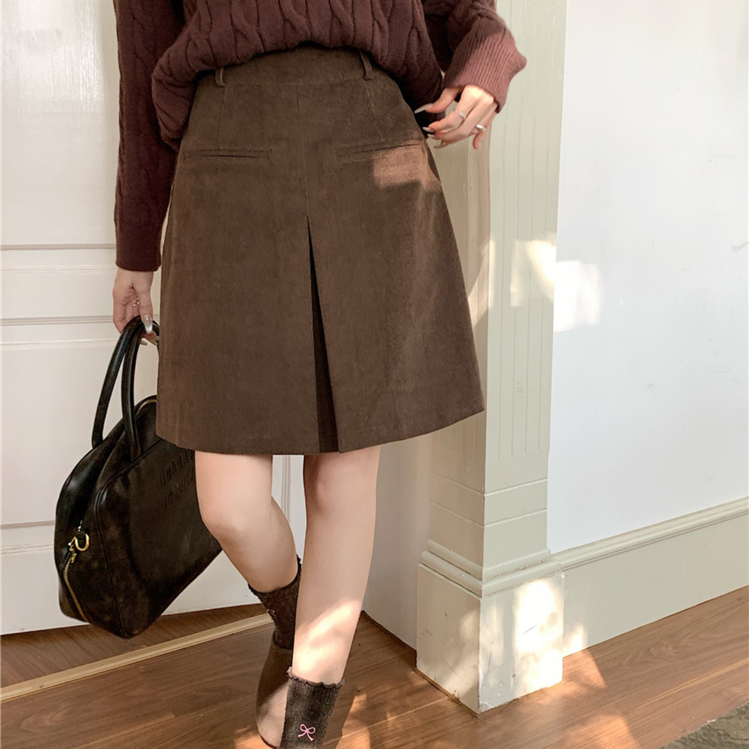 设计感A字灯芯绒中裙子