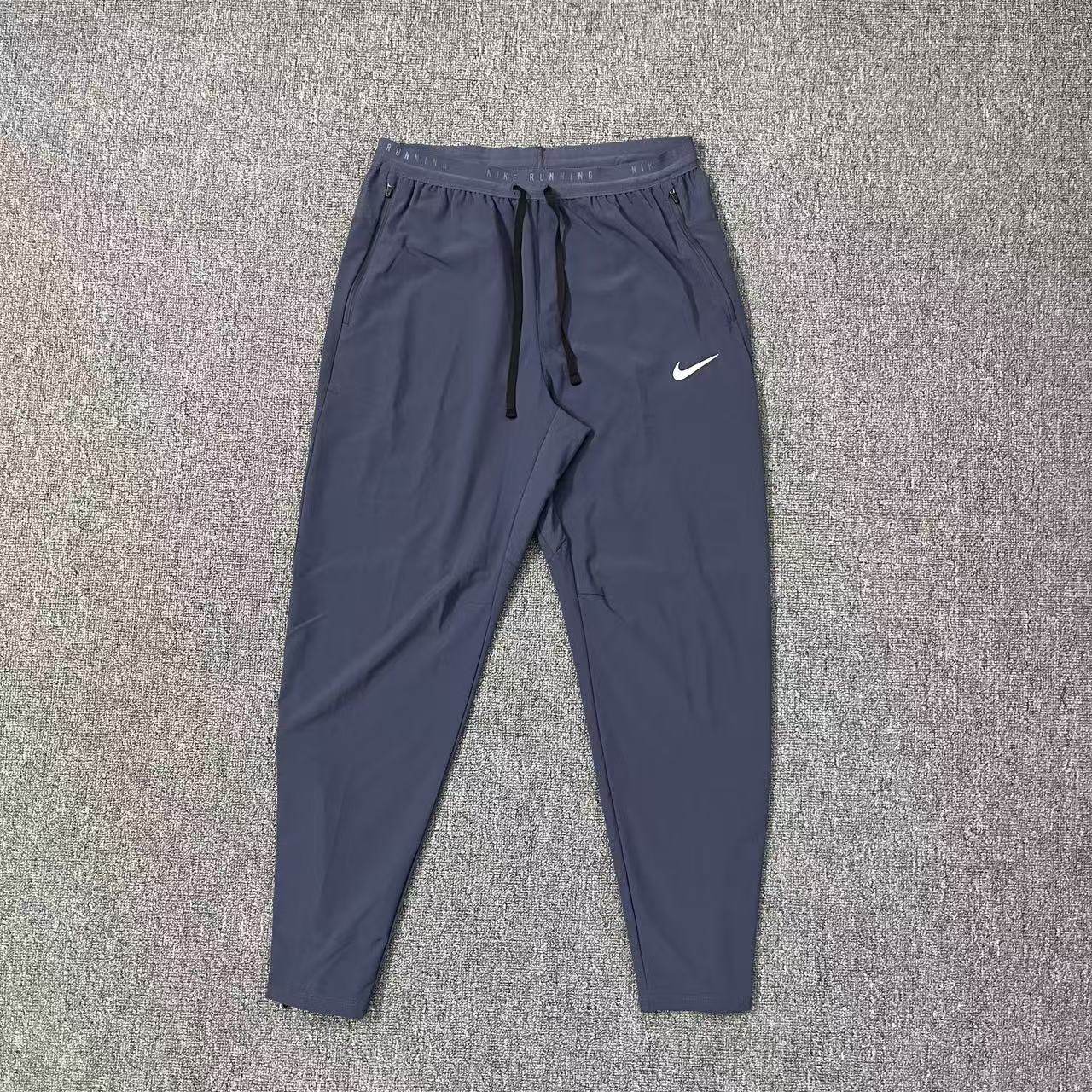 正品Nike耐克Stride Dri-FIT男子跑步运动训练梭织长裤HV4545-437