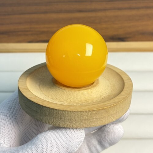 热销爆款非天然琥珀蜜蜡鸡油黄纯色手球手把件