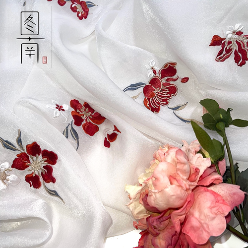 图南欧根纱服装山茶花绣花