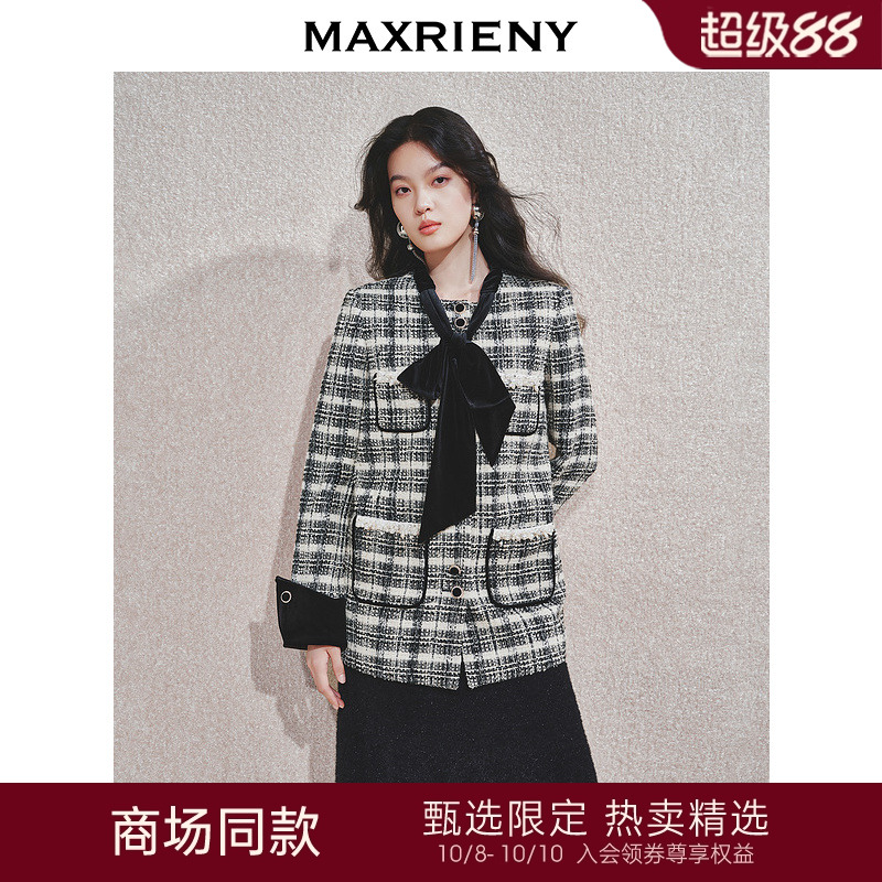大蝴蝶系带	局部手工钉珠	袖口翻折设计