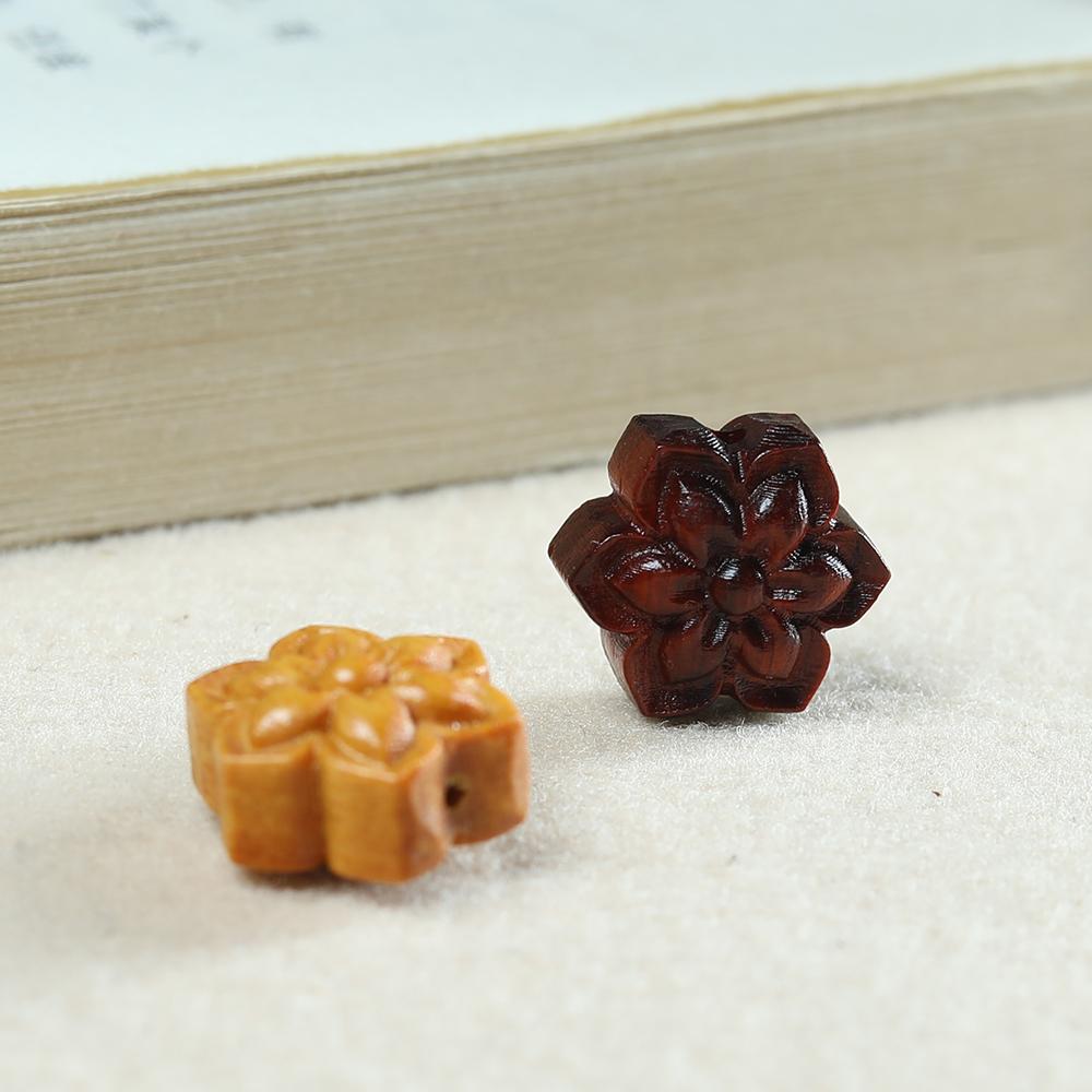 紫檀木雕刻小花佛珠手串图片