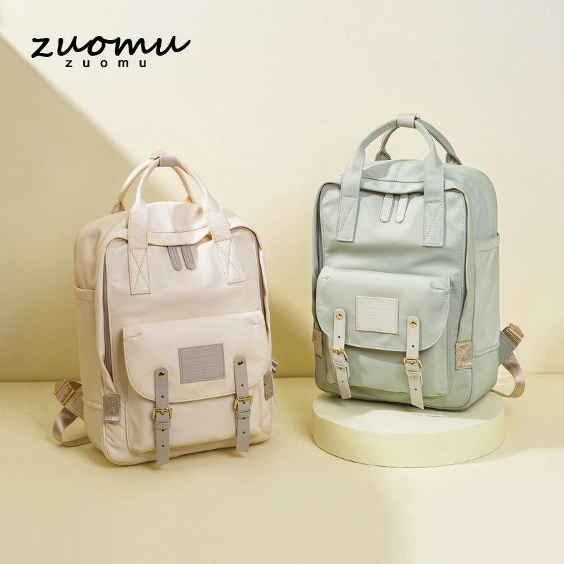 甜甜圈书包双肩包女2020新款大学生时尚高中旅行包轻便背包大容量