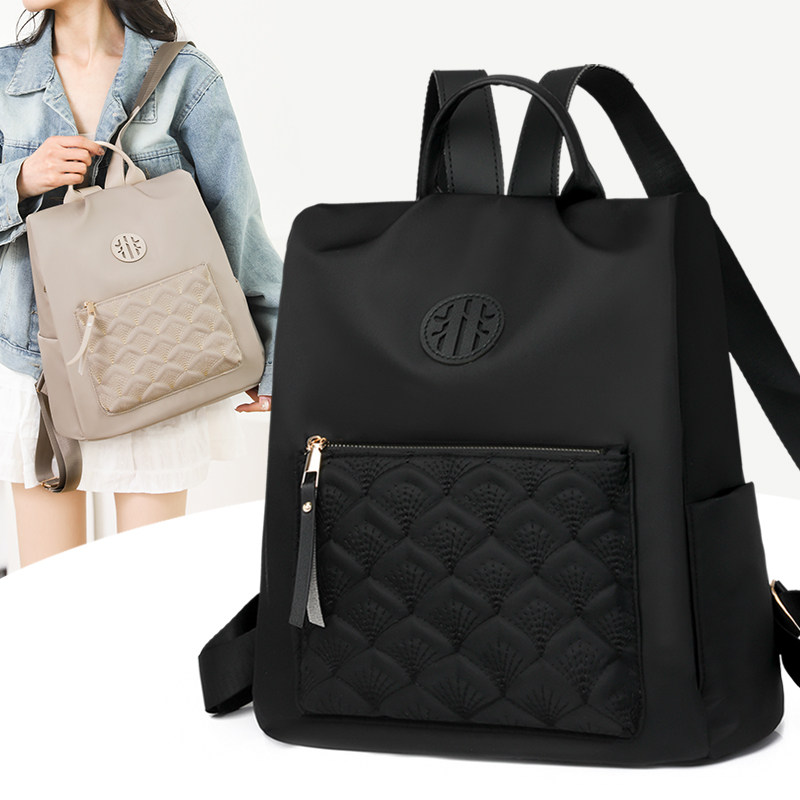 轻便防水大容量双肩包女2025新款时尚牛津布防盗通勤旅行包书包夏