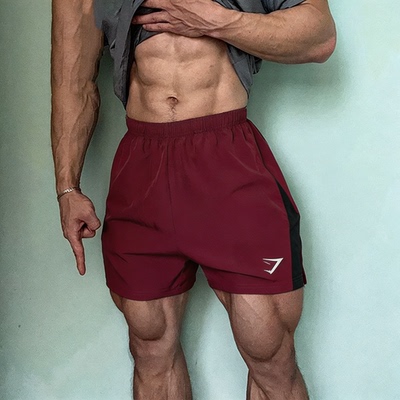 gymshark鲨鱼透气速干运动短裤夏季宽松拼色健身训练三分深蹲裤子