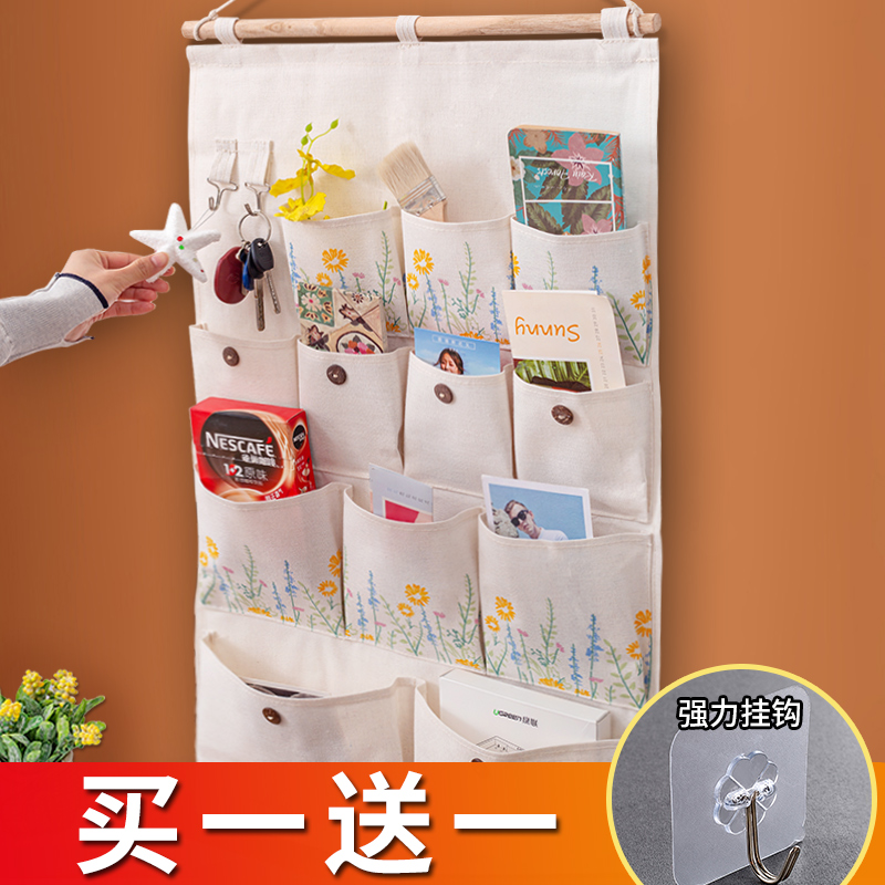 布艺挂手机收纳挂袋壁挂墙挂式宿舍墙上储物袋门后神器悬挂置物袋 Изображение 1 布艺挂手机收纳挂袋壁挂墙挂式宿舍墙上储物袋门后神器悬挂置物袋 Изображение 1