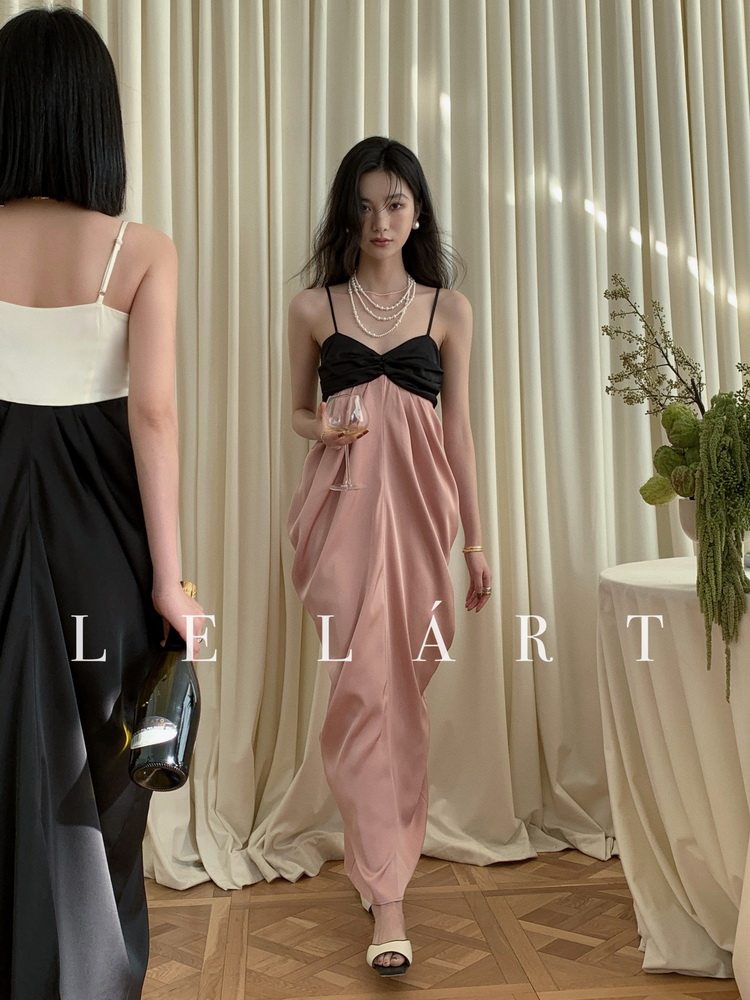 Elegant colorblock satin dress worn by a model