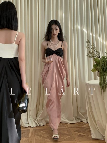 Elegant colorblock satin dress worn by a model