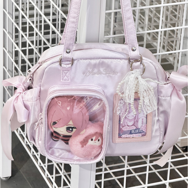 奥尔达单肩斜挎学生党小食量痛包